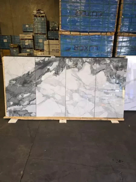 Glacier White Glossy 24x48 Porcelain Tile — a large-format glossy white tile featuring a sleek, reflective surface that enhances light and creates a spacious, modern aesthetic. Perfect for walls and floors in kitchens, bathrooms, and contemporary living areas. Each box contains 2 pieces covering 16 sq ft. Durable, elegant, and easy to maintain.