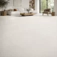 Urbancrete White 24×48 matt porcelain tile installed in a straight pattern across a modern living room floor.
