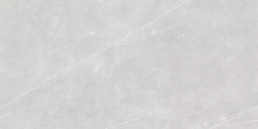 Aran Light Grey Polished Porcelain Tile β a luxurious marble-look porcelain in soft light grey shades with delicate veining and a high-gloss polished finish. Its bright surface adds elegance and sophistication while ensuring durability, water resistance, and easy maintenance. Ideal for refined floors and walls in kitchens, bathrooms, and modern living spaces.