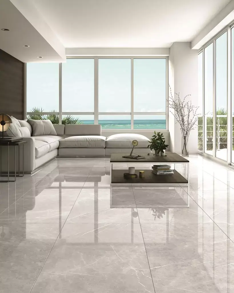 Aran Light Grey Polished Porcelain Tile β a luxurious marble-look porcelain in soft light grey shades with delicate veining and a high-gloss polished finish. Its bright surface adds elegance and sophistication while ensuring durability, water resistance, and easy maintenance. Ideal for refined floors and walls in kitchens, bathrooms, and modern living spaces.