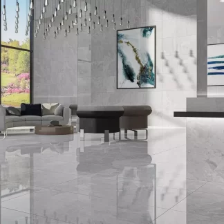 Camouflage Blanco Pulido Porcelain Tile — a luxurious white marble-look porcelain with a brilliant polished finish that enhances brightness and elegance. Its glossy surface brings sophistication and depth while offering durability, water resistance, and easy maintenance. Ideal for creating refined floors and walls in kitchens, bathrooms, and modern living spaces.