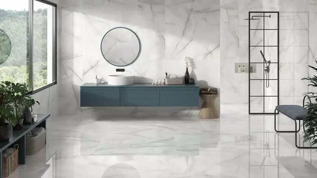 Baltra Pearl Polished Porcelain Tile β a luxurious marble-look porcelain in elegant pearl-white tones with subtle veining and a brilliant polished finish. Its glossy surface enhances brightness and sophistication while ensuring durability, water resistance, and easy maintenance. Perfect for stylish floors and walls in kitchens, bathrooms, and modern living areas.