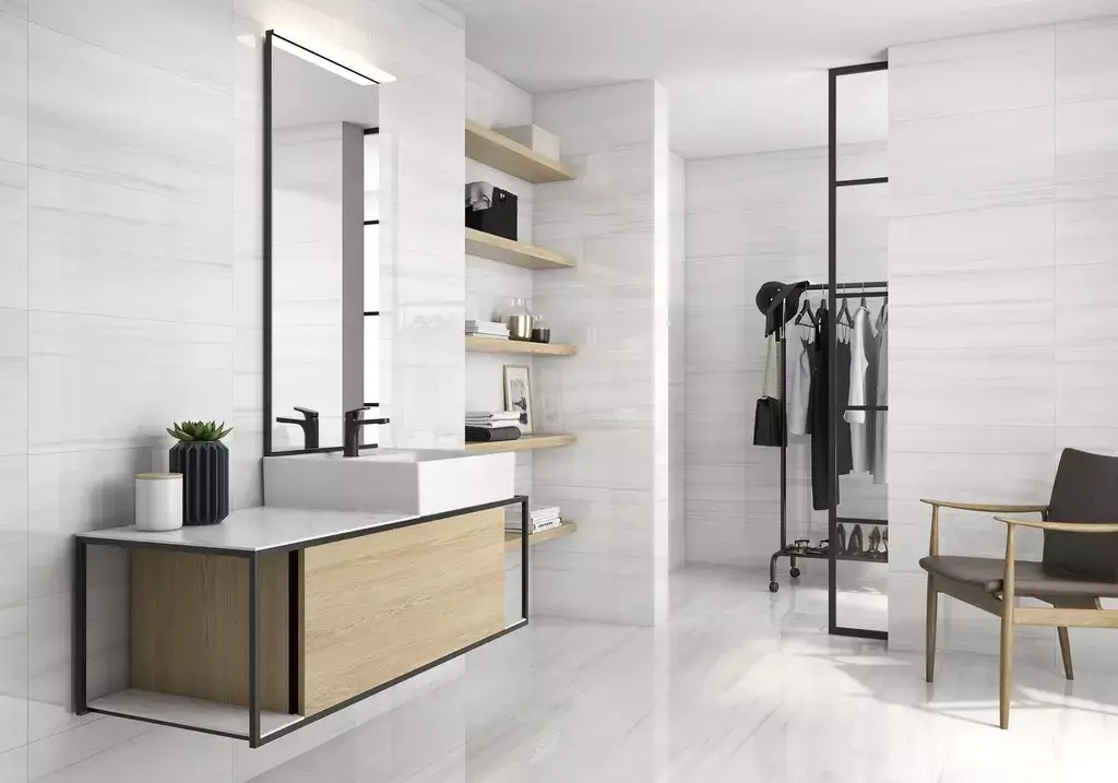 Dolomita White Pulido Porcelain Tile β a luxurious marble-look porcelain in bright white tones with subtle veining and a brilliant polished finish. Its glossy surface enhances brightness and sophistication while ensuring durability, water resistance, and easy maintenance. Ideal for elegant floors and walls in kitchens, bathrooms, and modern living spaces.