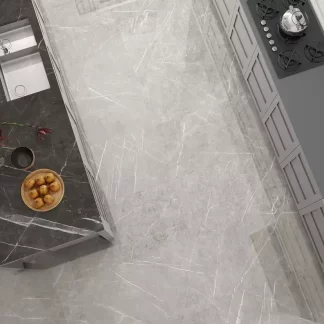 Columbia Perla Mate Porcelain Tile — a refined marble-look porcelain in soft pearl-grey tones with delicate veining and a natural matte finish. Its satin surface offers subtle elegance while ensuring durability, water resistance, and easy maintenance. Ideal for stylish floors and walls in kitchens, bathrooms, and modern living spaces.
