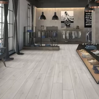Versate Ash 8x48 Porcelain Tile — contemporary wood-look porcelain in refined ash grey tones with authentic grain details. The long 8x48 plank format enhances the natural wood effect while delivering the durability, water resistance, and easy maintenance of porcelain. Ideal for floors and walls in kitchens, bathrooms, and living spaces.
