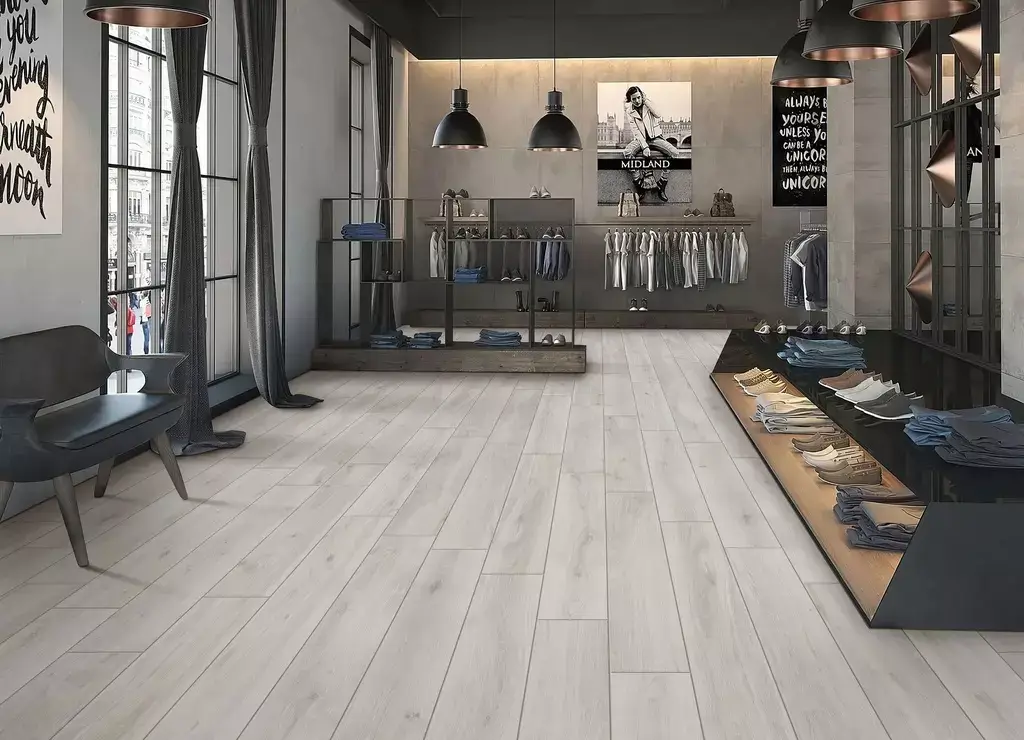 Versate Ash 8x48 Porcelain Tile β contemporary wood-look porcelain in refined ash grey tones with authentic grain details. The long 8x48 plank format enhances the natural wood effect while delivering the durability, water resistance, and easy maintenance of porcelain. Ideal for floors and walls in kitchens, bathrooms, and living spaces.