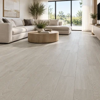 Chaplin Grey Natural 8x47 wood look porcelain tile installed in a modern living room with light grey flooring, neutral furniture, and natural lighting.