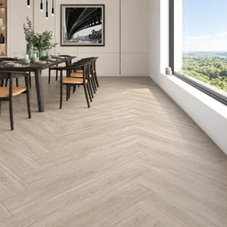 Chelsea Oliva 8x48 Wood Look Porcelain Tile installed in a modern dining room with a herringbone floor pattern, matte finish, and natural lighting.