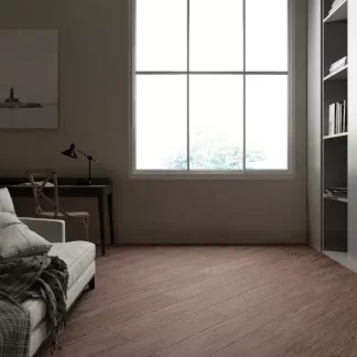 Chelsea Walnut Porcelain Tile — elegant wood-look porcelain inspired by natural walnut wood, featuring rich brown tones and realistic grain detail. Designed for both floors and walls, this durable and water-resistant tile combines the warmth of wood with the strength and easy maintenance of porcelain. Perfect for kitchens, bathrooms, and living areas.