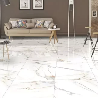 Carrara Venice Porcelain Tile β a timeless marble-look porcelain inspired by the elegance of Carrara stone, featuring delicate grey veining on a refined white background. Its luxurious finish enhances any space while maintaining the durability, water resistance, and low maintenance of porcelain. Perfect for sophisticated floors and walls in kitchens, bathrooms, and living areas.