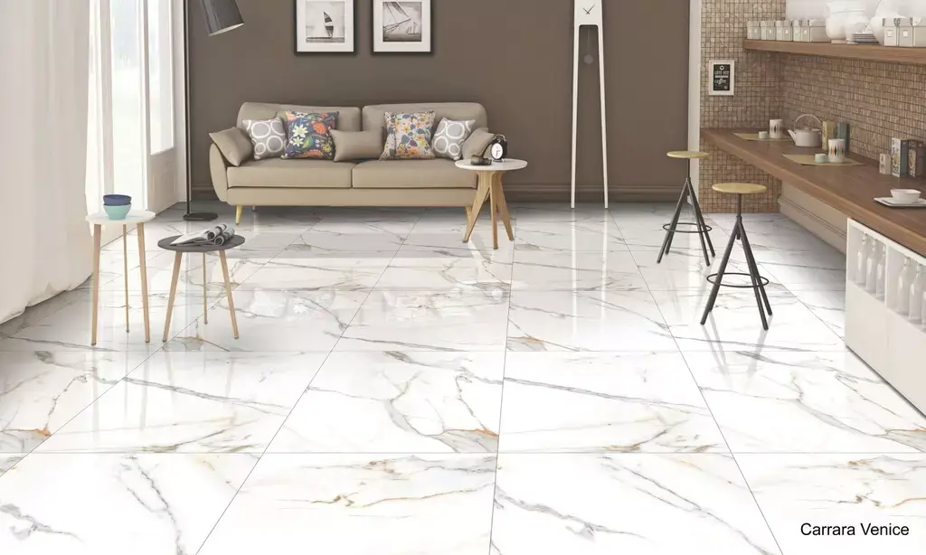 Carrara Venice Porcelain Tile β a timeless marble-look porcelain inspired by the elegance of Carrara stone, featuring delicate grey veining on a refined white background. Its luxurious finish enhances any space while maintaining the durability, water resistance, and low maintenance of porcelain. Perfect for sophisticated floors and walls in kitchens, bathrooms, and living areas.