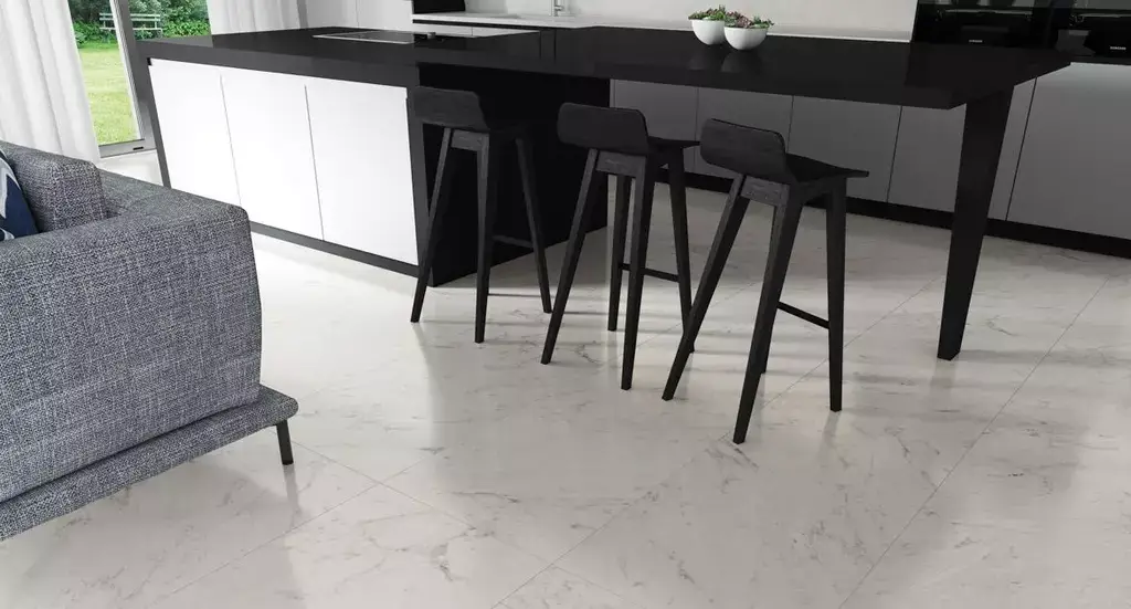 Lumina Carrara Polished 23x47 Porcelain Tile β elegant marble-look porcelain inspired by classic Carrara stone, featuring a polished glossy finish and refined veining. The 23x47 large format enhances spaces with brightness and sophistication while offering the durability, water resistance, and easy maintenance of porcelain. Ideal for luxurious floors and walls in kitchens, bathrooms, and living areas.