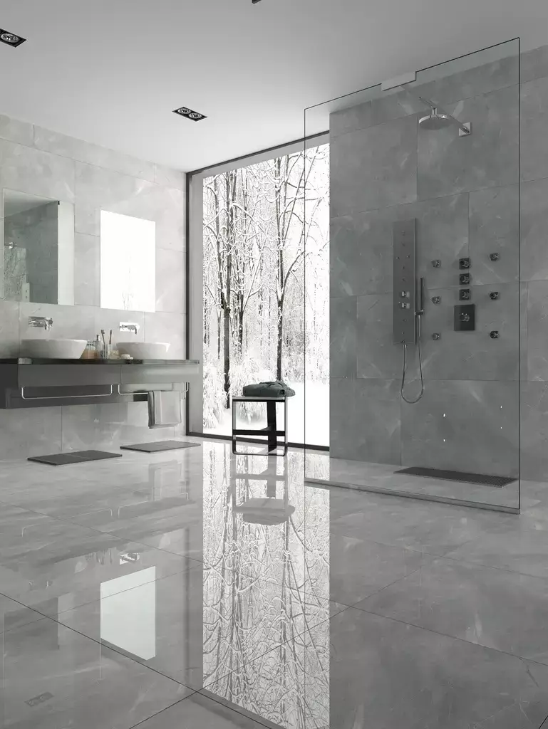 Pulpis Grey Polished Porcelain Tile β a refined marble-look porcelain in deep grey tones with subtle veining and a high-gloss polished finish. Its elegant surface enhances sophistication and brightness while delivering durability, water resistance, and easy maintenance. Ideal for stylish floors and walls in kitchens, bathrooms, and modern living spaces.