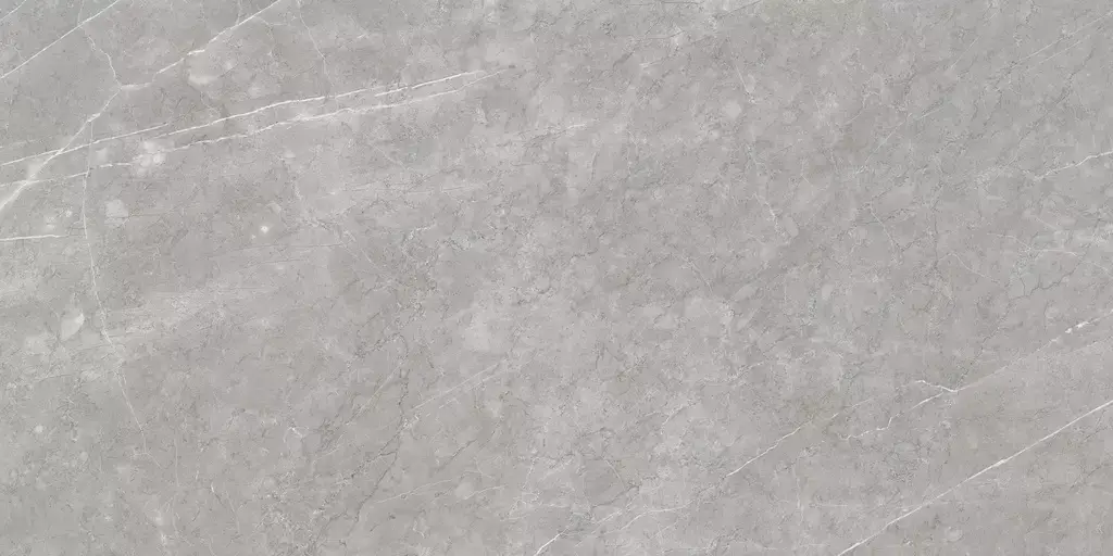 Aran Grey Polished Porcelain Tile β a sophisticated marble-look porcelain in refined grey tones with elegant veining and a high-gloss polished finish. Its luxurious surface enhances brightness and style while ensuring durability, water resistance, and easy maintenance. Ideal for floors and walls in kitchens, bathrooms, and modern living spaces.