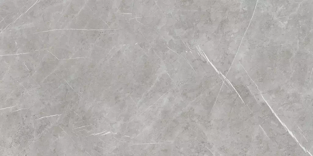 Aran Grey Polished Porcelain Tile β a sophisticated marble-look porcelain in refined grey tones with elegant veining and a high-gloss polished finish. Its luxurious surface enhances brightness and style while ensuring durability, water resistance, and easy maintenance. Ideal for floors and walls in kitchens, bathrooms, and modern living spaces.