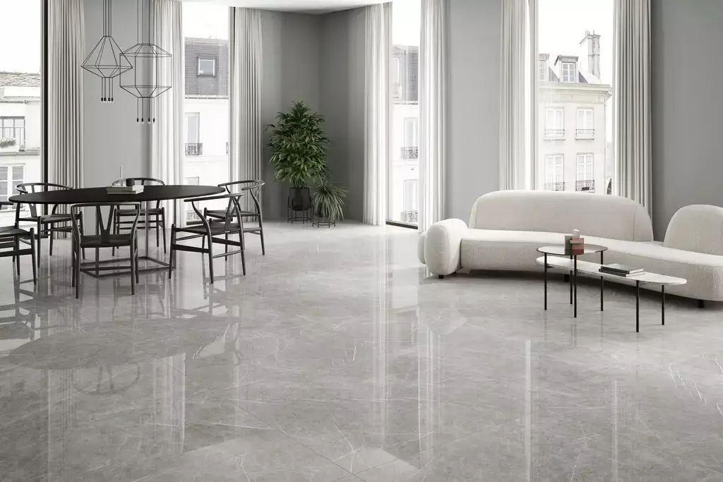 Aran Grey Polished Porcelain Tile β a sophisticated marble-look porcelain in refined grey tones with elegant veining and a high-gloss polished finish. Its luxurious surface enhances brightness and style while ensuring durability, water resistance, and easy maintenance. Ideal for floors and walls in kitchens, bathrooms, and modern living spaces.