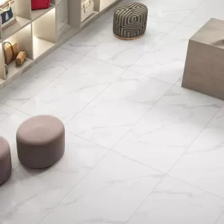 Essential White Porcelain Tile β a timeless marble-look porcelain in pure white with delicate veining, available in polished or matte finishes. Its elegant surface enhances light and space while offering durability, water resistance, and easy maintenance. Ideal for refined floors and walls in kitchens, bathrooms, and contemporary living spaces.