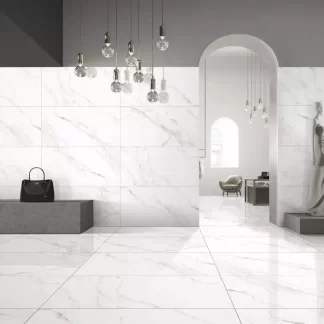 Naos Alpine Pulido Porcelain Tile β a sophisticated marble-look porcelain inspired by alpine stone, featuring bright white tones and delicate veining with a polished glossy finish. Its luxurious design enhances brightness and elegance while ensuring durability, water resistance, and easy maintenance. Perfect for stylish floors and walls in kitchens, bathrooms, and living areas.