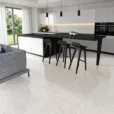 Lumina Carrara polished porcelain tile, 23x47 inches, with a white marble-look design and soft gray veining.