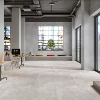 Concrete Cenere matte porcelain tile installed in a modern commercial office