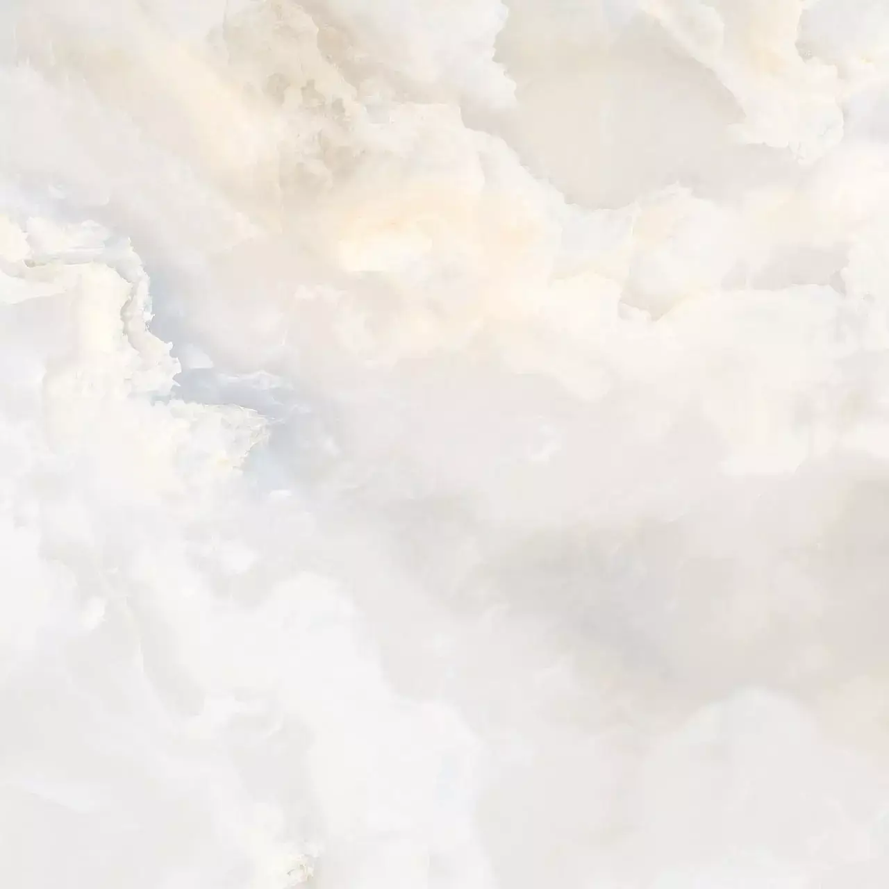 Cloud Sky Onyx porcelain tile featuring a soft sky-inspired blend of blues, whites, and onyx-style veining. Offers a luxurious polished finish ideal for creating elegant, modern floors and statement walls.