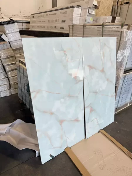 Vita Bella 24x48 porcelain tile featuring a sophisticated white marble look with soft grey veining. Large-format design ideal for modern floors and walls, offering a luxurious appearance, high durability, and easy maintenance for bathrooms, kitchens, and living areas.