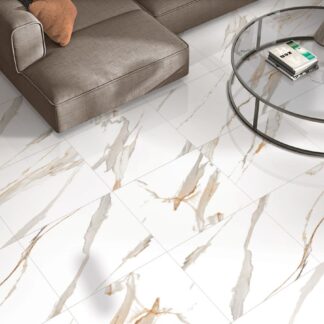 Carrara Polaris Gold 24x24 porcelain tile with a polished white and gold marble look installed in a luxury living room by The Flooring District in Tampa, Florida.