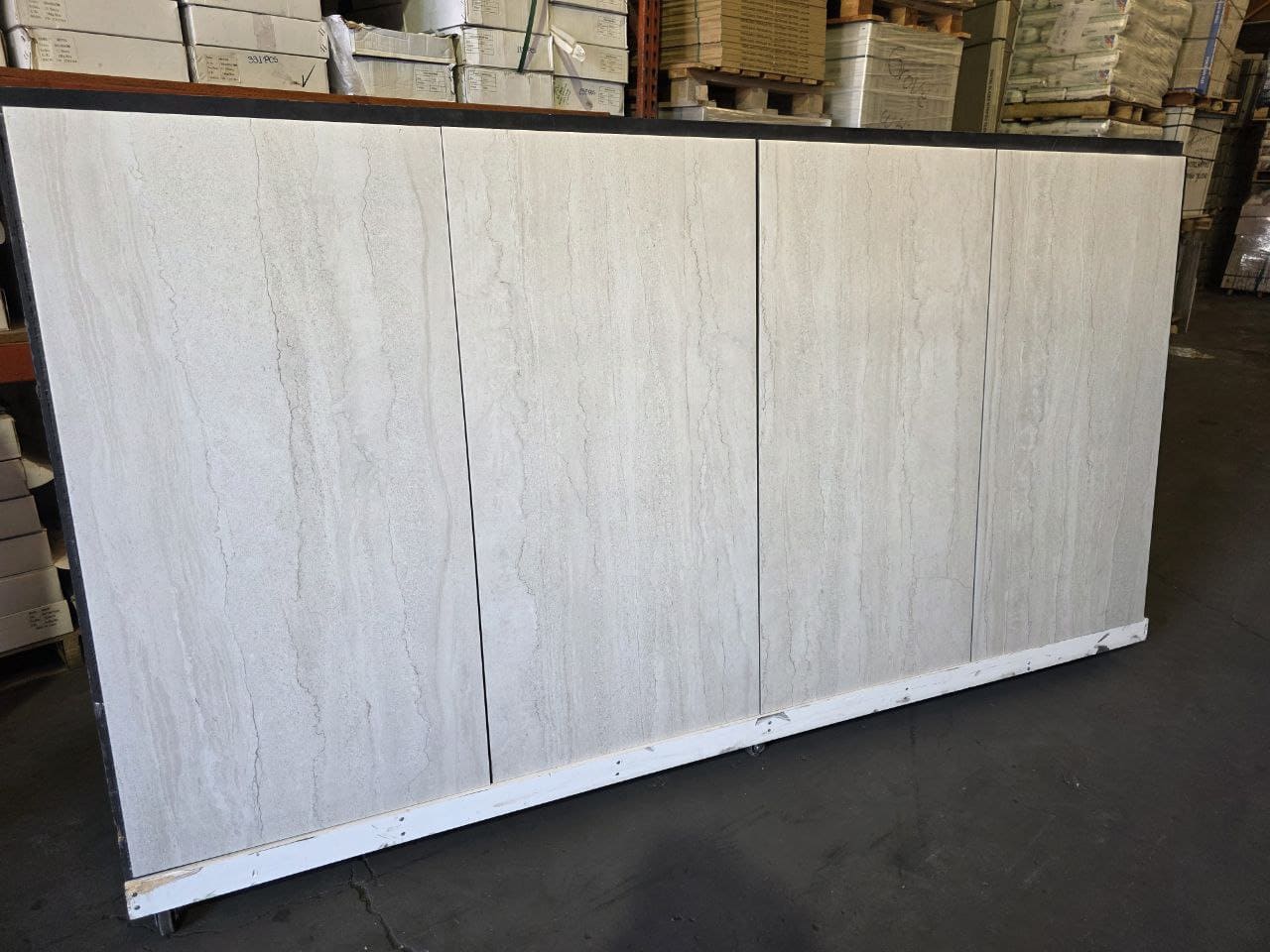 Dorset Blanco porcelain tile with a matte white natural stone look for luxury flooring by The Flooring District in Tampa, Florida.