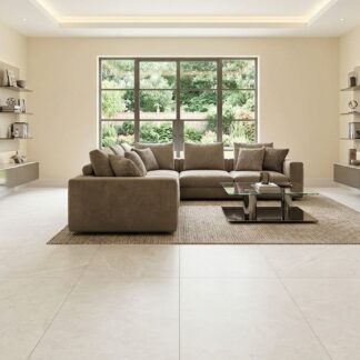 Coralstone Marfil 24x48 matt porcelain tile showcasing a textured cream reef stone look and soft ivory colors for coastal organic interior design by The Flooring District in Tampa, Florida.