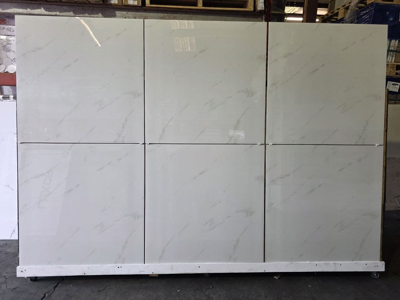 Calacatta Moza 32x32 Glossy Porcelain - The Flooring District.