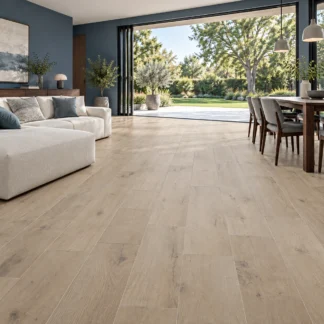 Oldmanor Ambar wood-look porcelain tile in an open living and dining room with wide doors overlooking a garden.