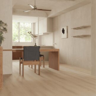 Vanilla SPC vinyl flooring with a light oak wood look installed in a minimalist modern kitchen by The Flooring District in Tampa, Florida.